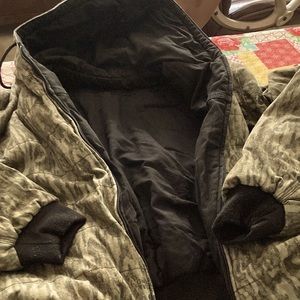 Browning, Mossy Oak camo reversible coat.